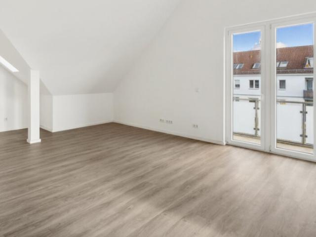 Wohnkomfort im Grünen: 3 Zimmer Dachgeschosswohnung im Neubau