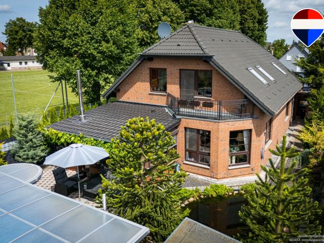 Wohnkomfort & Individualität vereint hochwertiges Wohnen mit Wiga, Spa Oase & Gartenidylle