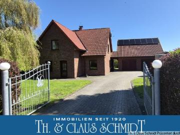 Wohnhaus, Bj. 1998, mit Gartenhaus und 3 Garagen zw. OL und Brake