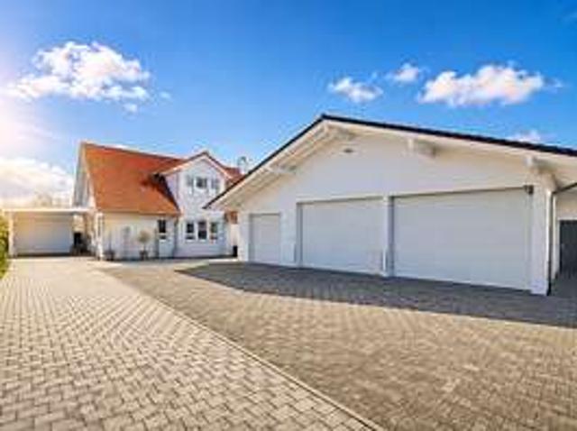 Wohnhaus mit vermieteten Gewerbeeinheiten – attraktive Kombination aus Wohnen und Rendite