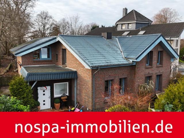 Wohnhaus mit viel Wohnfläche, Doppelgarage mit Abstellraum und Terrasse in Munkwolstrup