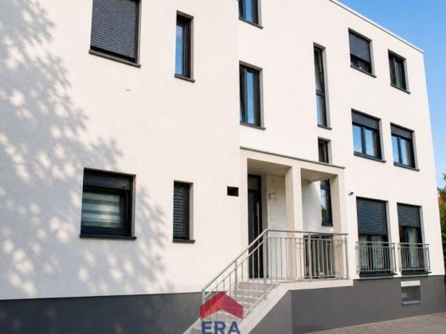 Wohnqualität auf höchstem Niveau – Moderne Erdgeschosswohnung mit Garten in Bürstadt zu verkaufen!