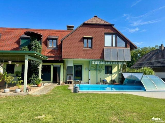 Wohntraum am Fuße der Gerlitzen – Zweifamilienhaus mit Pool in Bodensdorf