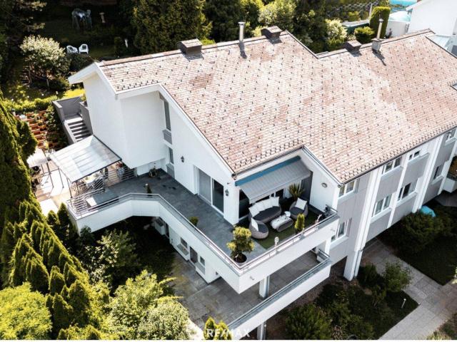 Wohntraum der Extraklasse: Exklusives Penthouse auf 2 Etagen mit großer Terrasse und schönem Garten in begehrter Lage