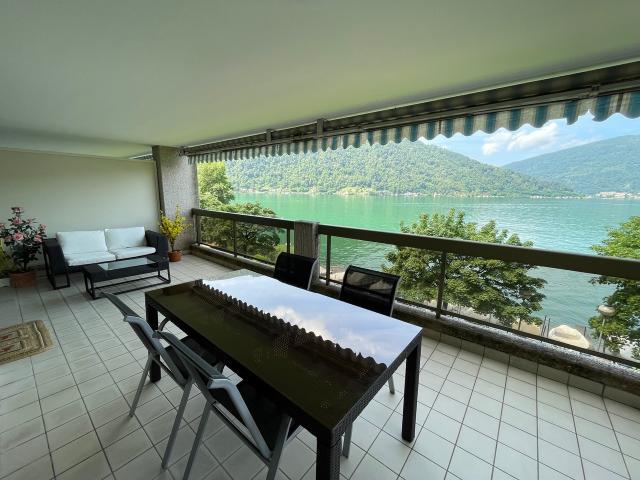 ! APPARTEMENT MIT ZWEI TERASSEN DIREKT AM SEE !