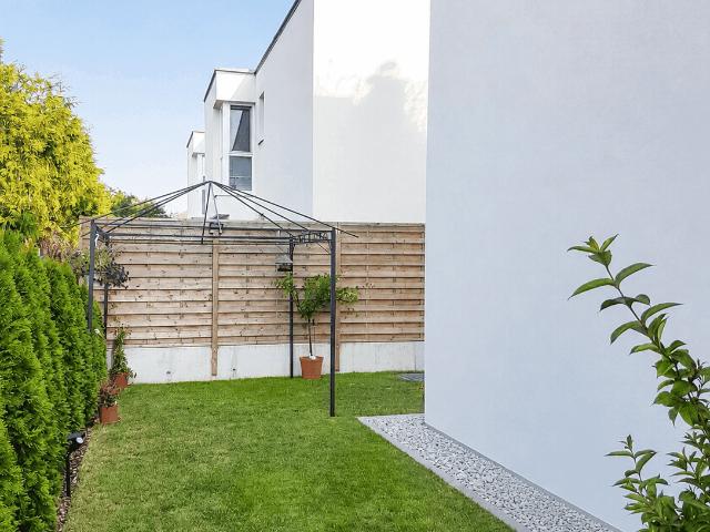 Wohnung mit Eigengarten und Terrasse sowie Tiefgaragenstellplatz