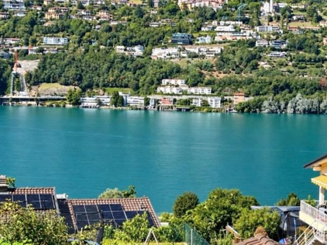 Wohnung mit Panoramaterrasse, Swimmingpool und herrlichem Seeblick