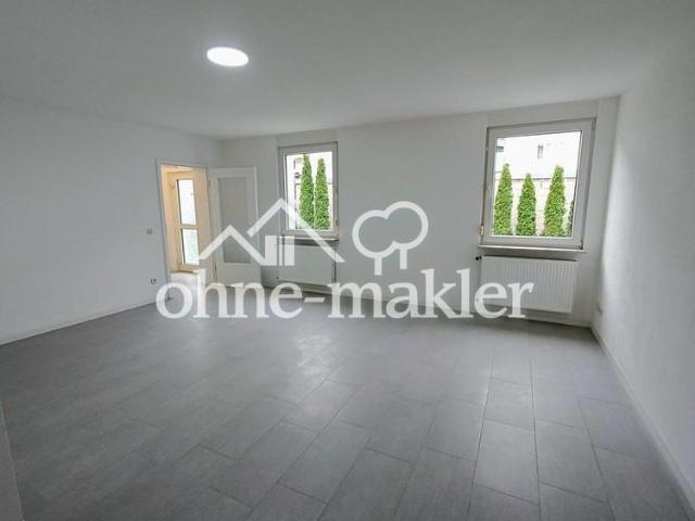 Wohnung im EG mit Terrasse und Gartenzugang