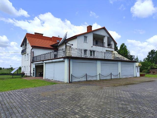 Zapraszam do obejrzenia przestronnego domu 380 m² z halą i biurem na inwestycję