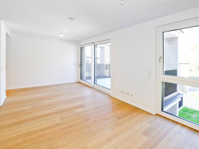 WOLKE SIEBEN: Charmante 2 Zimmer Gartenwohnung mit Terrasse