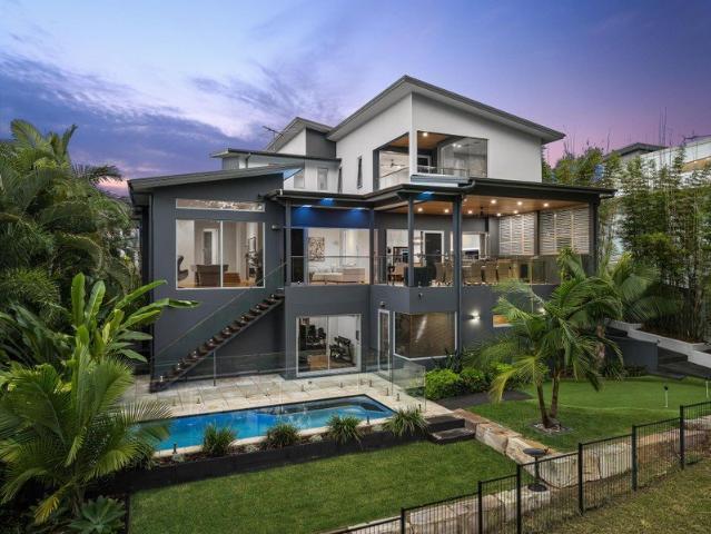 WOW! Must see Resort Style living on 13th Fairway!