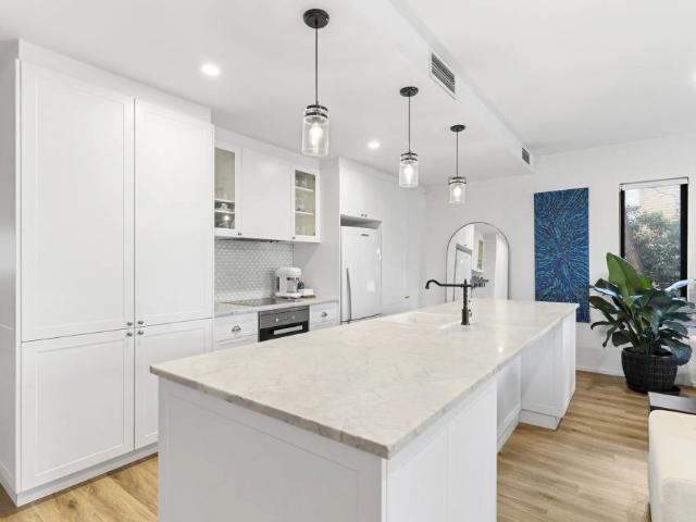 WOW! THIS APARTMENT IS ONE TO INSPECT