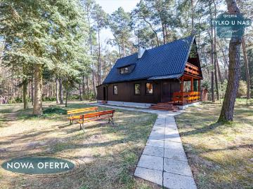 Urokliwy dom rekreacyjny 63 m² z kominkiem i prywatnością