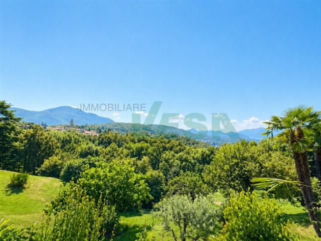 Wunderbare Liegenschaft mit Villa, romantischem Rustico und Bauland