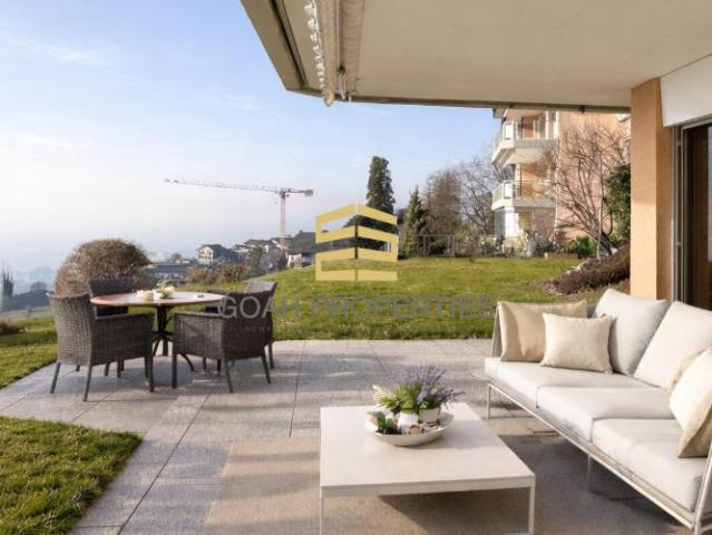 Wunderschöne 3.5 Zimmerwohnung mit Gartenterrasse und Panoramablick auf den See
