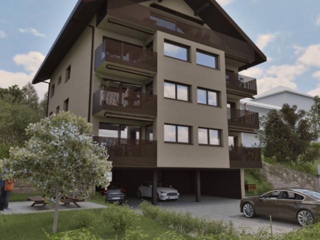 Wunderschöne neue 4½ Zimmer Wohnung im Obergeschoss mit 2 Balkonen, privatem Garten und freier Aussicht