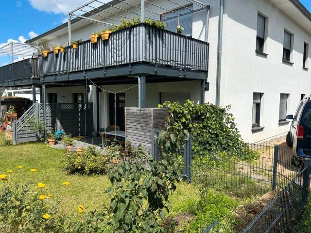 Wunderschöne neuwertige Eigentumswohnung mit eigenem Garten!
