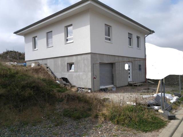 XS Bungalow, unterkellert mit innovativer Heiz und Belüftungstech