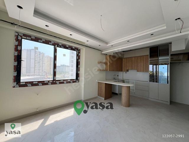YAŞA GYD ÇEŞMELİDE DENİZE YAKIN YAŞAM HAVUZLU SİTEDE 2+1