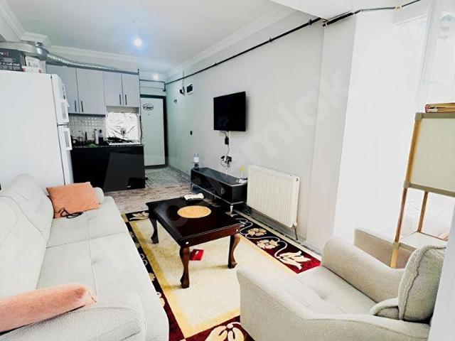 YENİ MAHALLEDE SATILIK YENİ YAPIYENİ EŞYALI BALKONLU 1+1