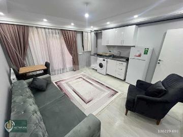 YENİ BİNADA CADDE DİBİ+35.000 TL KİRA GETİRİLİ EŞYA HEDİYELİ 2+1