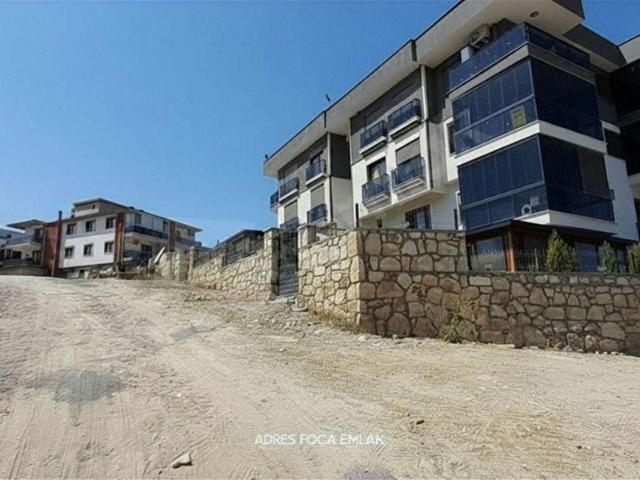 YENİFOÇA NAREZEN BÖLGESİNDE KİRALIK DENİZ MANZARALI ARAKAT 2+1 DAİRE