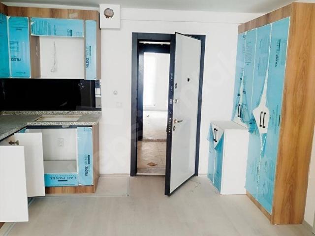 YENİÇİMŞİT'DE 1.KATTA AMERİKAN MUTFAKLI 1+1 SATILIK SIFIR DAİRE