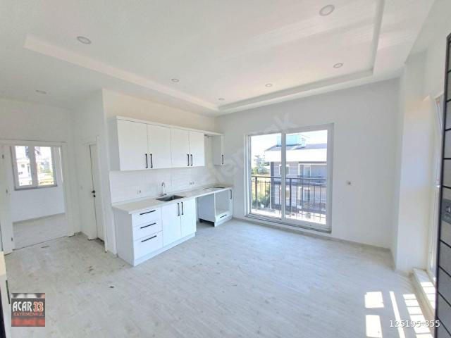 YENİKÖY MAHALLESİNDE HAVUZLU SİTE İÇİ 2.KAT SATILIK 2+1 DAİRE