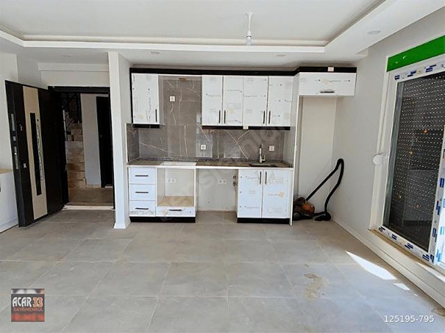 YENİKÖYDE MERKEZİ KONUMDA ARA KATTA 1+1 SATILIK DAİRE