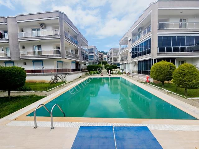 Yenifoça Poyraz Yaşam Evleri'nde Satılık Geniş 1+1 Daire