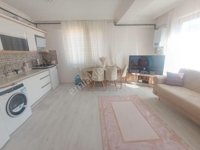 Yenifoça'da Satılık Açık Terasa Sahip 2+1 Daire