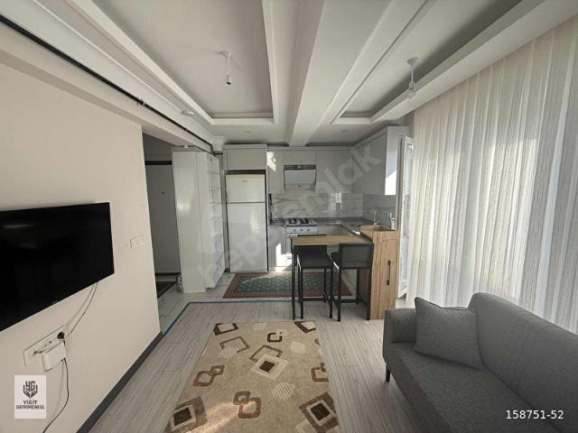 YİĞİT GAYRİMENKUL'DEN KİRALIK 1+1 EŞYALI KULLANIŞLI DAİRE