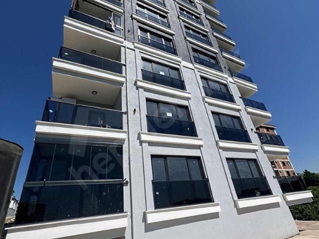 YİĞİT ÖZGÜNER EMLAK KARŞIYAKATERZİLİ FULL MANZARALI 2+1 DAİRE