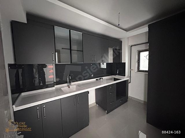YILDIZPARK'TAN KIZILAY TUNA CAD. ÜZERİ SIFIR KATTA 1+1 K.OTOPARK