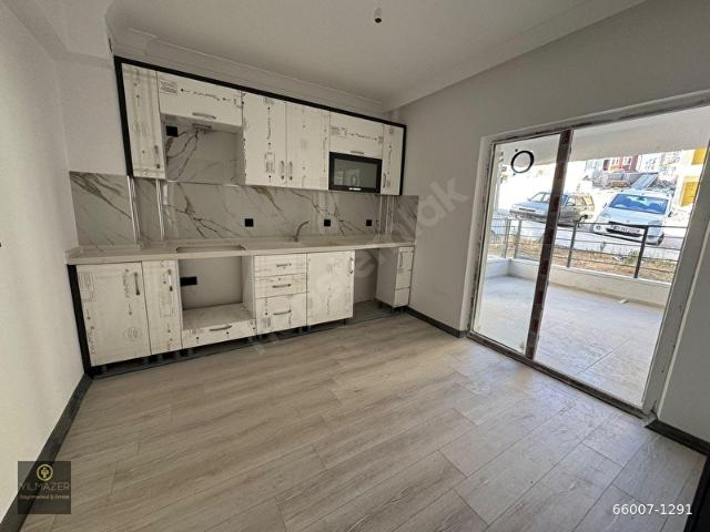 YILMAZER'DEN 4.CADDE'DE 2+1 YÜKSEK KİRA GETİRİLİ ALTTA DAİRE VAR