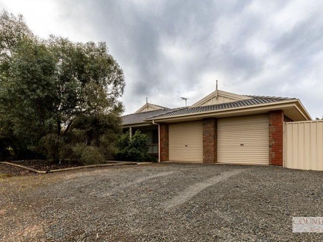 You'll LOVE Maxwell Street and this truly expansive home