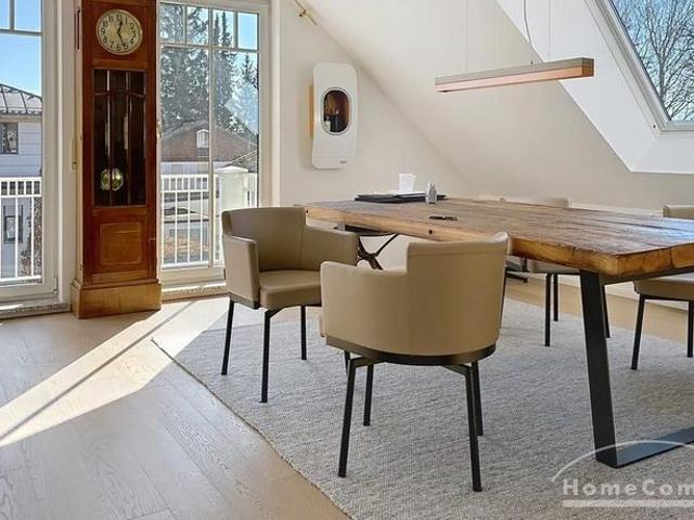 Your New Home: Exclusive Top Floor Apartment with Fireplace, Two Balconies & Parking Space