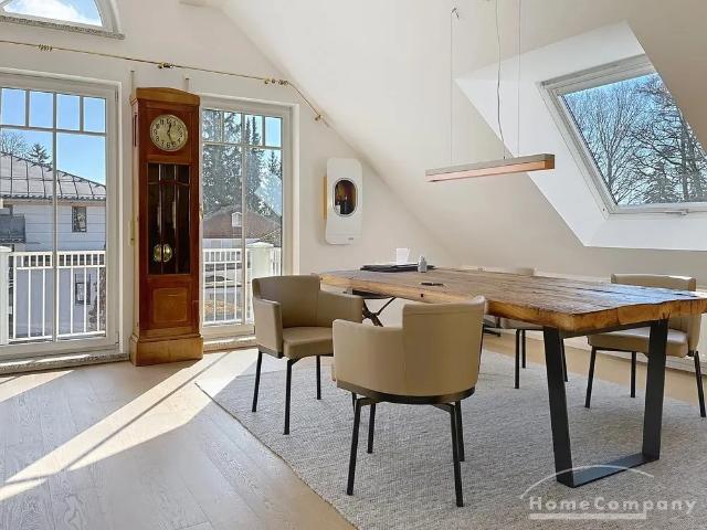 Your New Home: Partly furnished, exclusive Top Floor Apartment with Fireplace, Two Balconies & Parking Space
