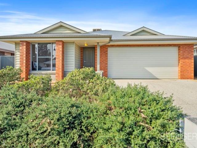 Your Next Chapter Begins at 12 Coco Crescent