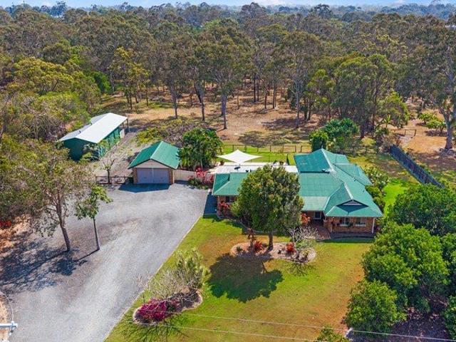 YOUR OWN PRIVATE ACREAGE ESCAPE. FIVE MINUTES FROM THE COAST