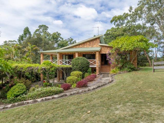 Your Own Slice of Paradise Creekside Living on Beautiful Acreage