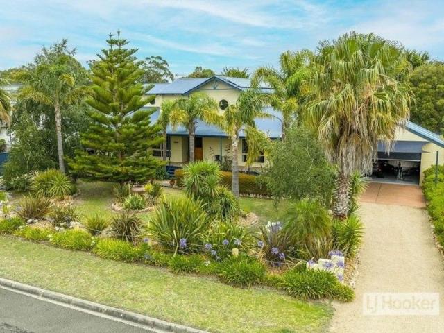 YOUR COASTAL SANCTUARY WITH LAKE VISTAS