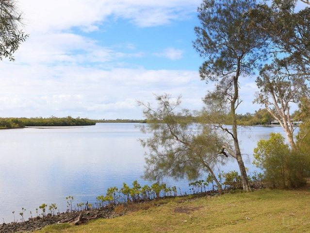 Waterfront Living with Endless Potential in One of Coombabah's Most Sought After Locations