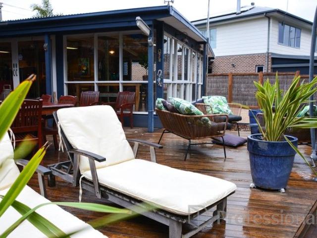 Your Front Row Beachside Retreat Awaits Footsteps from the Water! PRICE ADJUSTED $450,000 $475,000