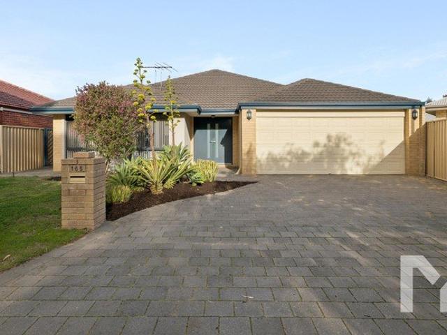 You're Invited to. A Family Home With Room for the Boat Too
