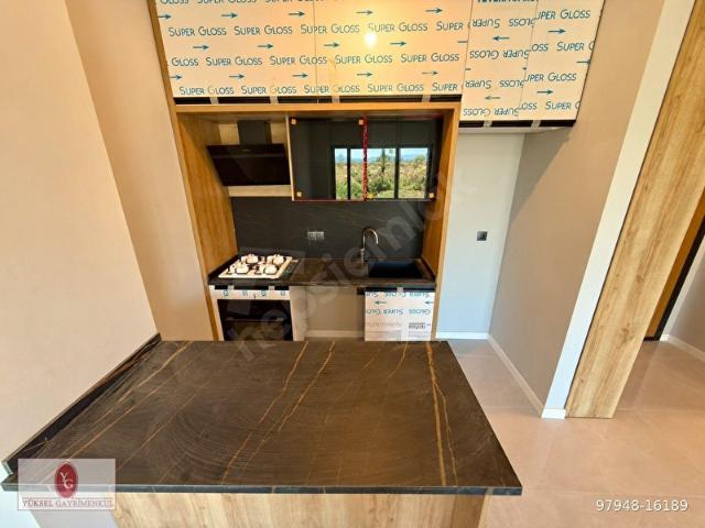 YÜKSELDEN ALTINKUMDA BAHÇE KULLANIMLI 1+1 LÜKS SATILIK DAİRE