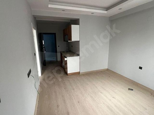 YUVADAN GÜLTEPEDE İSKANLI GENİŞ OTURUMLU KREDİYE UYGUN CAZİP 1+1 DAİRE!1
