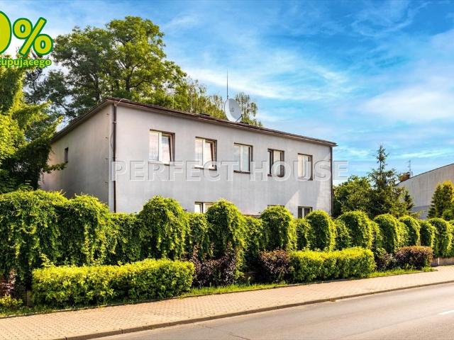 Zabudowana działka z biurami i mieszkaniami, 1168 m2