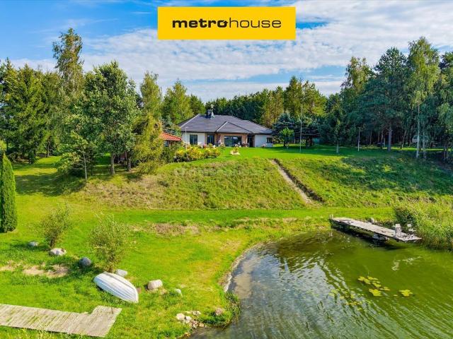 Zapraszam do domu nad jeziorem z 56 m linii brzegowej, 5 pokoi, taras, garaż