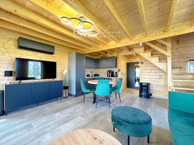 Na sprzedaż komfortowy dom 70 m² z tarasem, jacuzzi i ogrodem